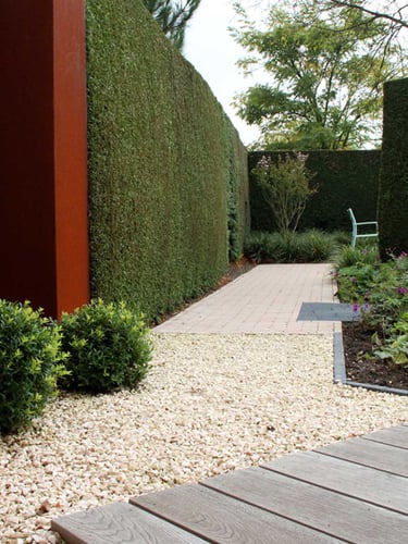 Yellow sun marble split 11 - 22mm aangelegde tuin